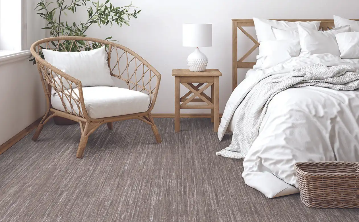 Brown carpet in wicker bedroom 